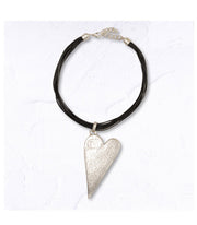 Giant heart multi string necklace