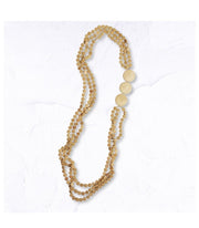 Mini wooden disc multi string necklace