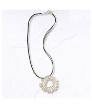 Textured circle multi string necklace