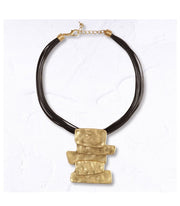 Multi string block necklace