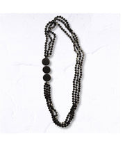 Mini wooden disc multi string necklace