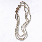 Multi string beaded necklace