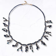 Multi string beaded necklace