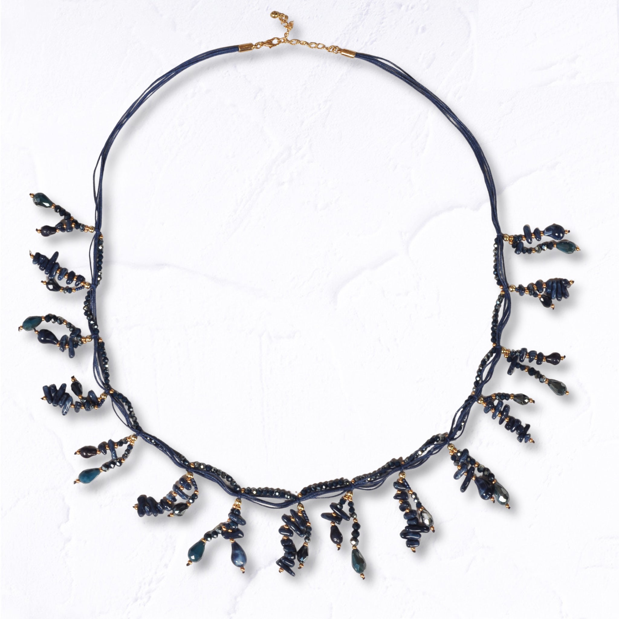 Multi string beaded necklace