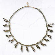 Multi string beaded necklace