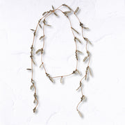Multi feather string necklace