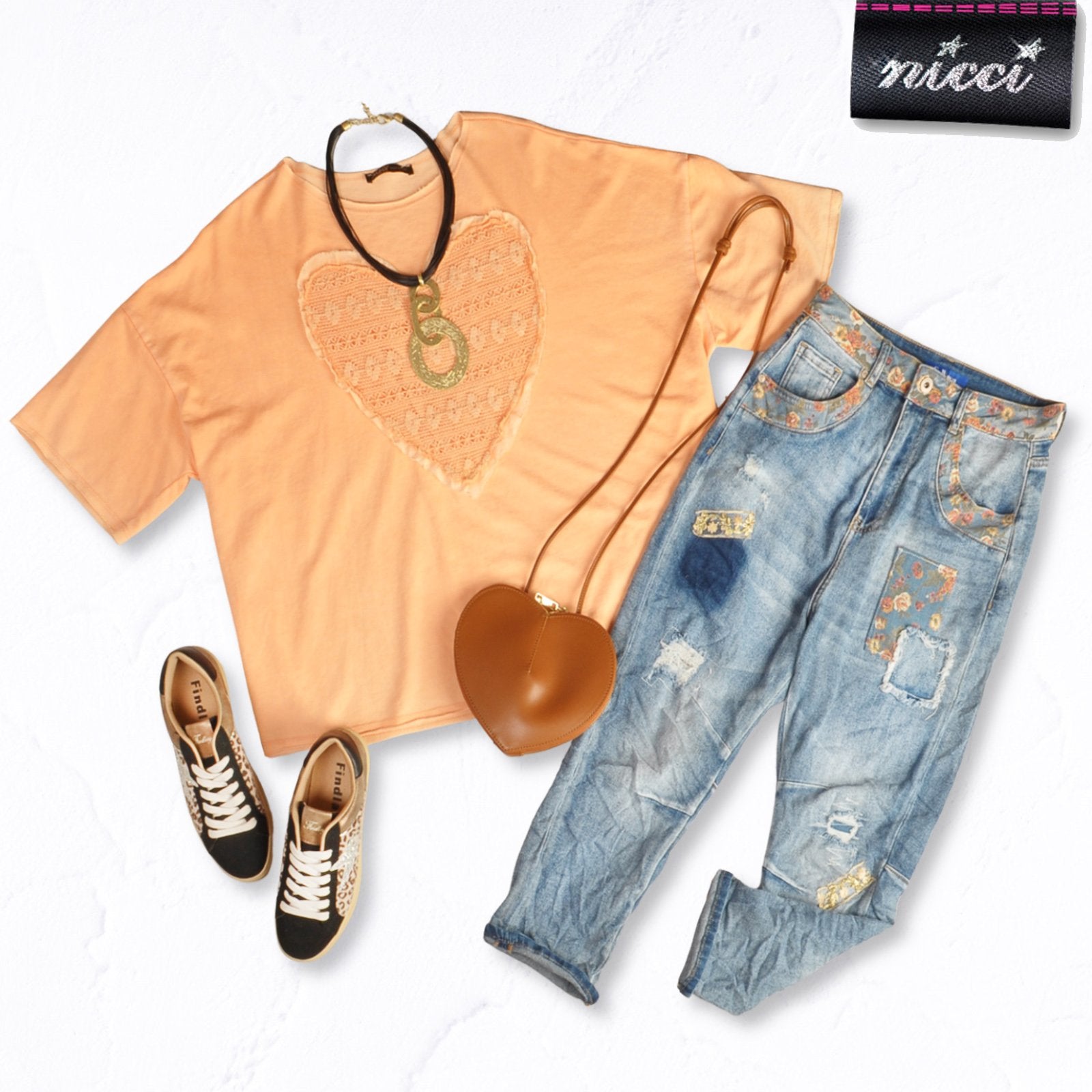 Raw-edge crochet heart oversized top