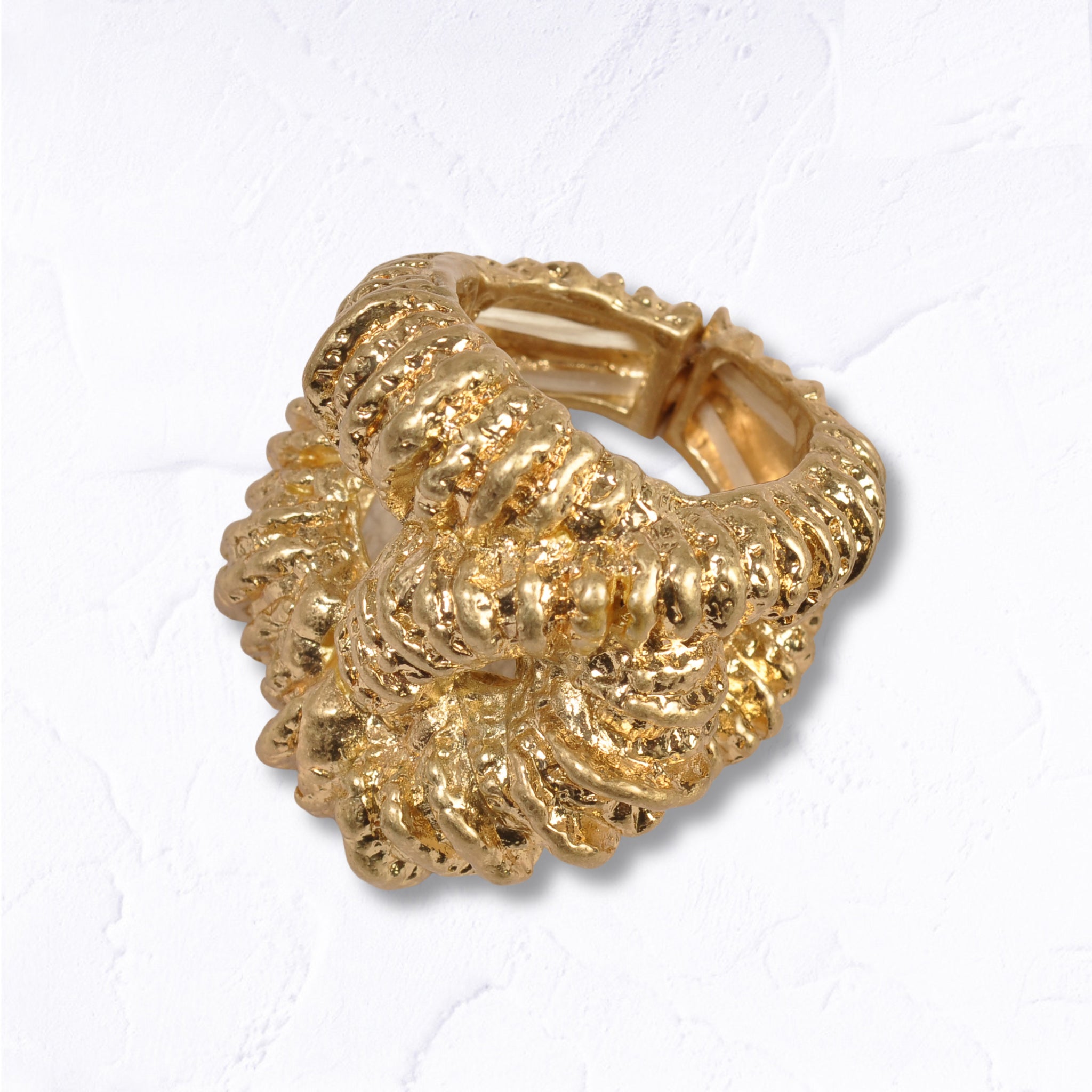 Textured interlocked elasticated ring