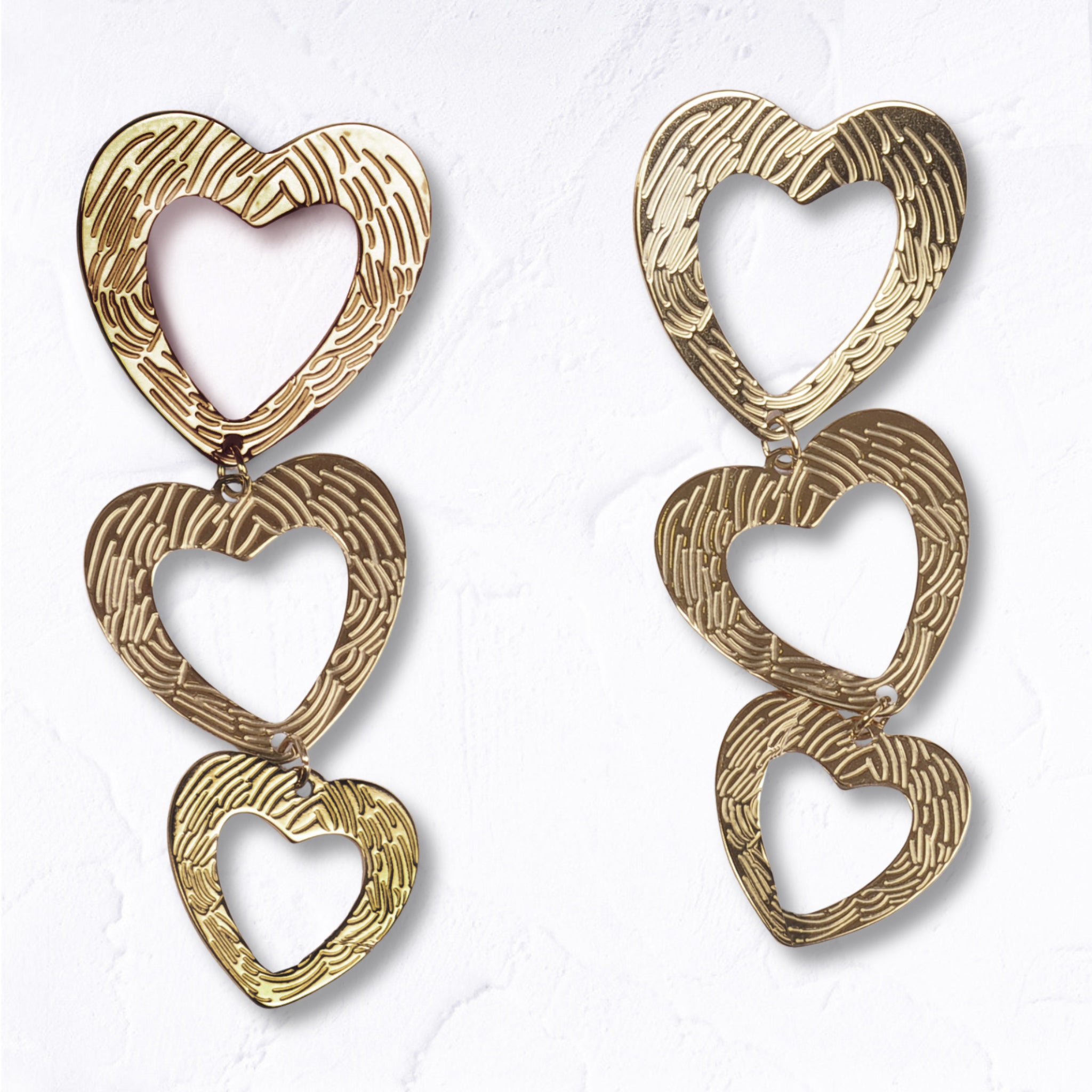 Textured tripple heart earrings