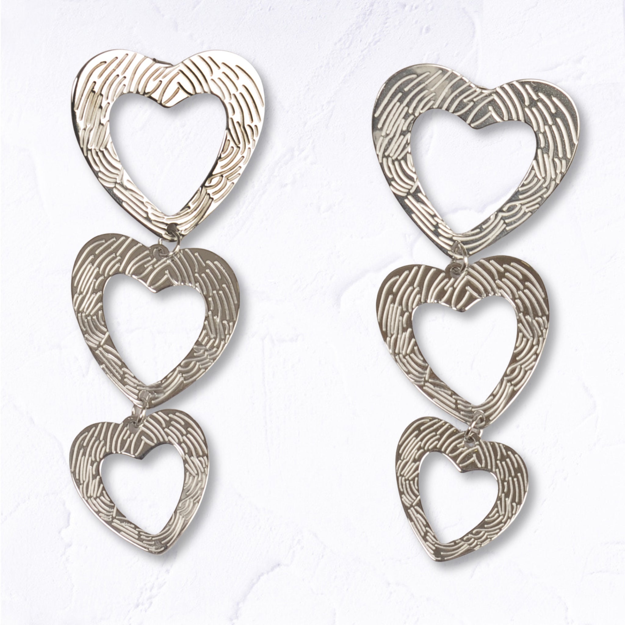 Textured tripple heart earrings