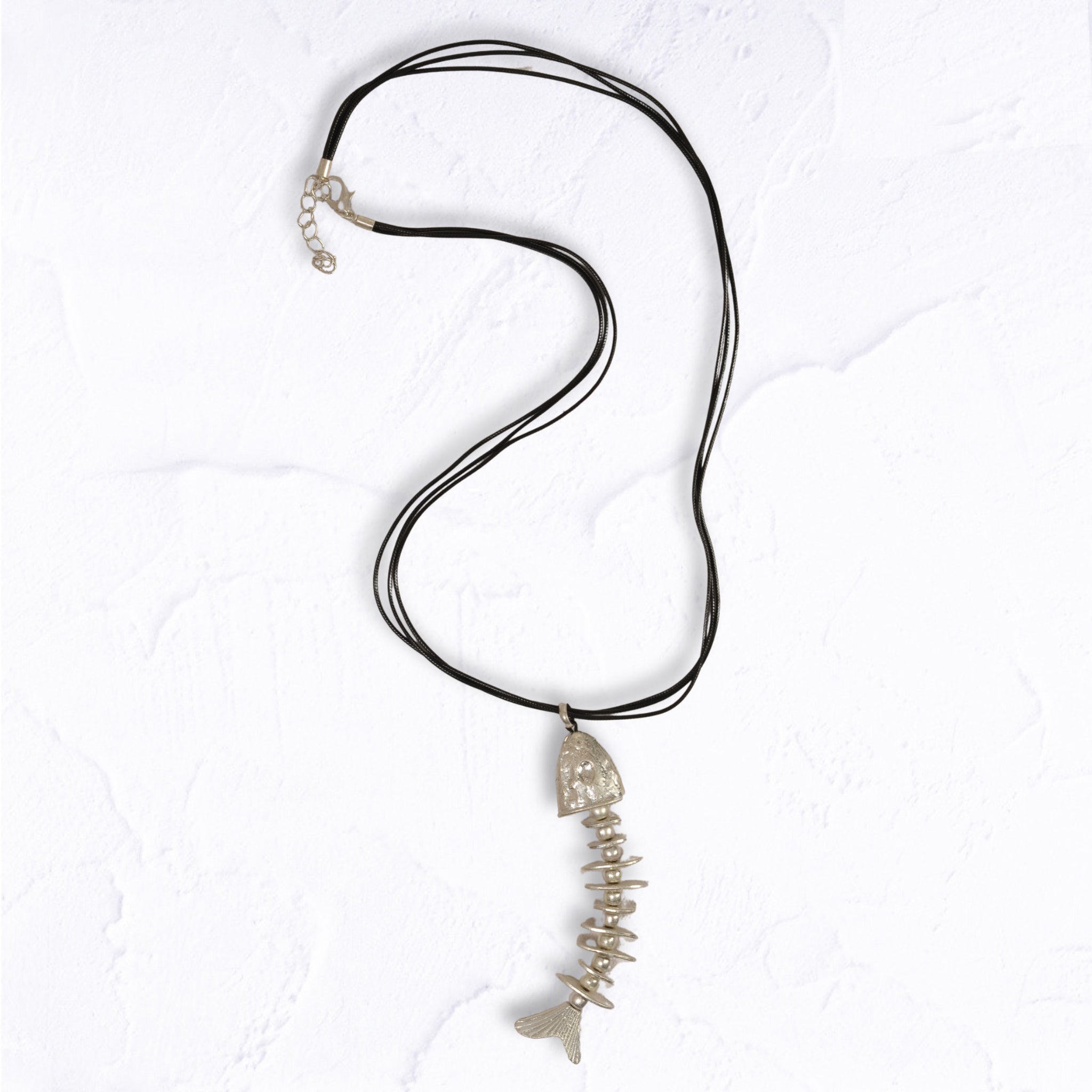 Fish pendant multi string necklace