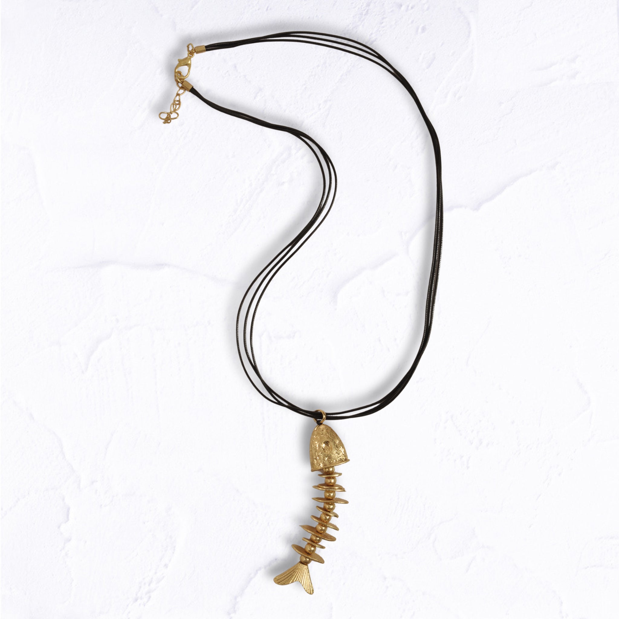 Fish pendant multi string necklace