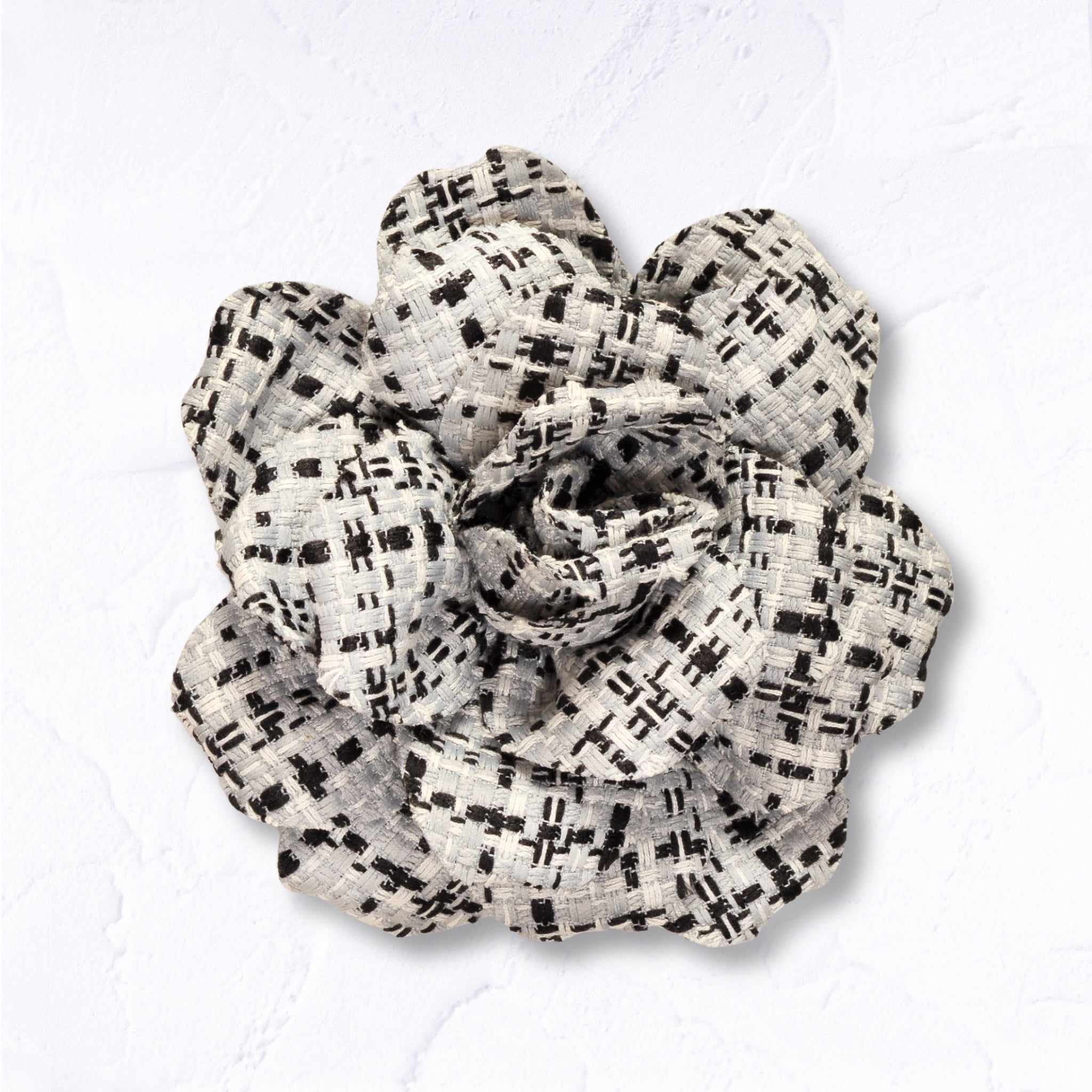 Check flower brooch