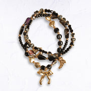 Bow charm multi string beaded bracelet