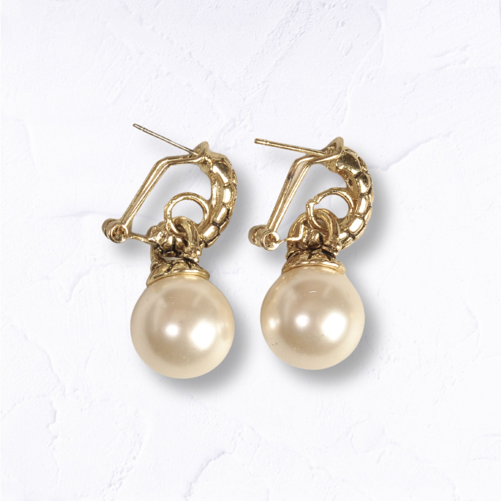 Giant pearl hoop earrings