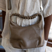 Scrunched handle geniune leather handbag