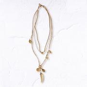 Multi charm horn pendant necklace