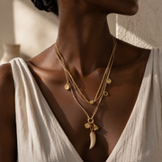 Multi charm horn pendant necklace