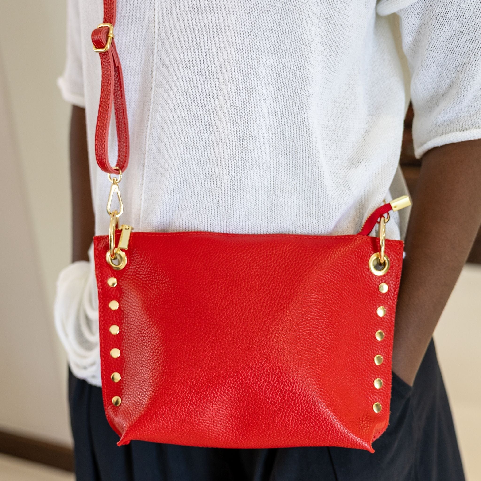 Gold stud eyelet genuine leather bag