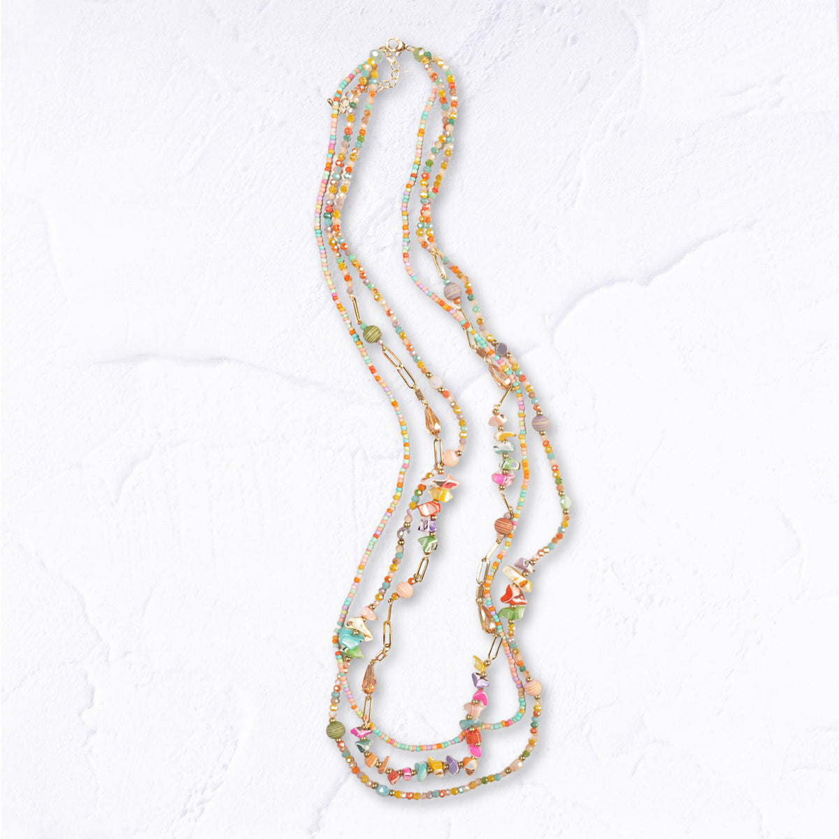 Multi string shape stone bead necklace